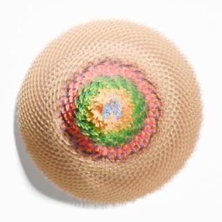PaintShed flower with woven cream petals and a colourful centre