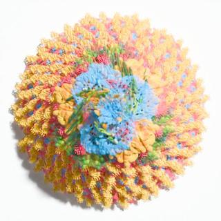 PaintShed flower with a soft blue centre and radiating pastel petals